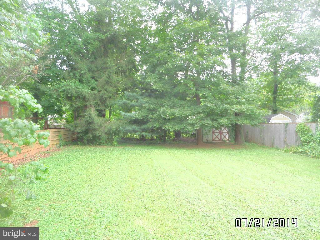 608 Cliveden Road Baltimore, MD 21208 - Photo 22 of 23 a view of a big yard with an outdoor space