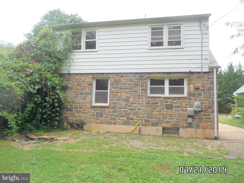608 Cliveden Road Baltimore, MD 21208 - Photo 23 of 23 a view of a house with a backyard