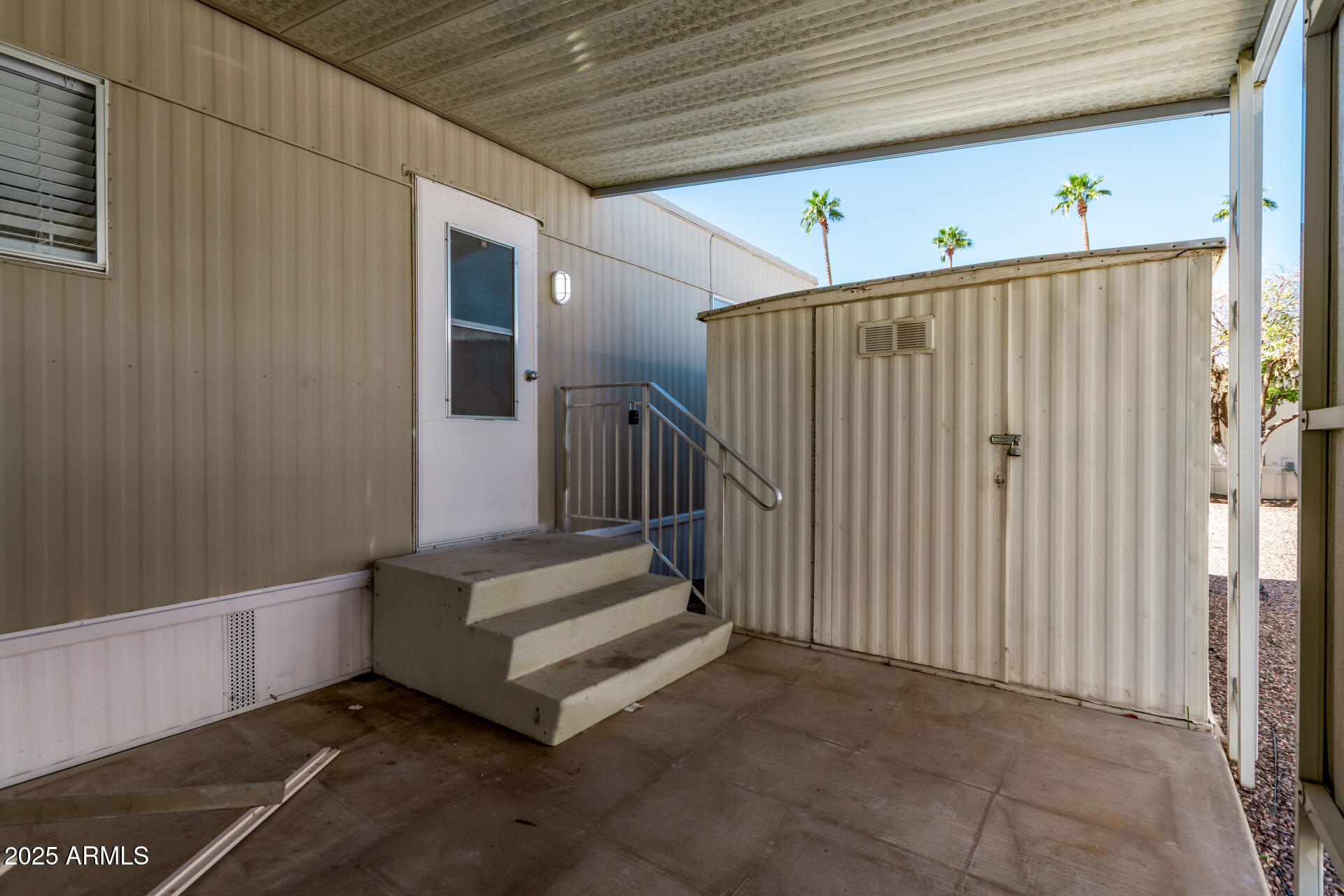303 South Recker Road, Unit 200 Mesa, AZ 85206 - Photo 7 of 29 a view of a hallway with staircase