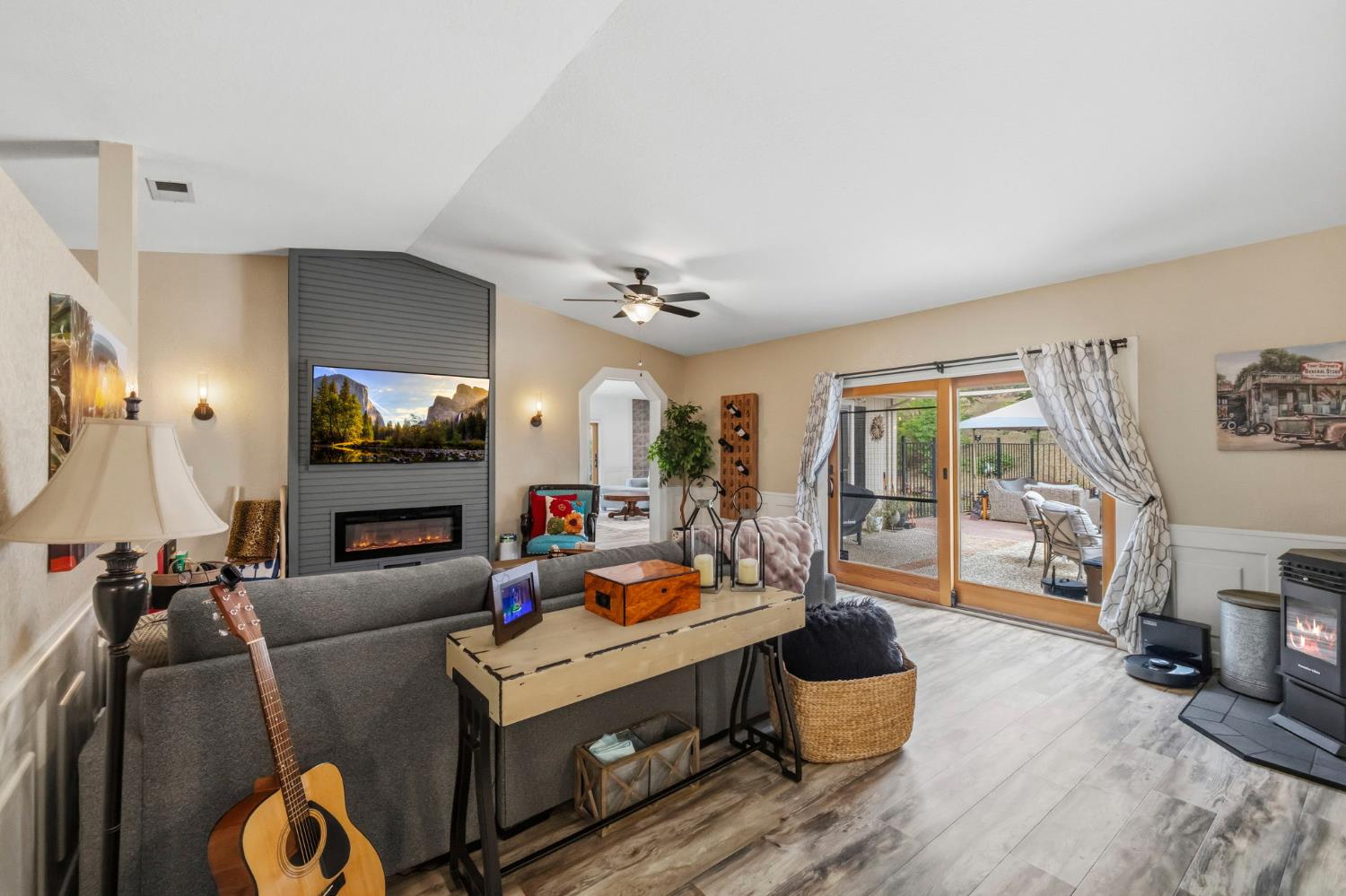 11460 Racetrack Road Sonora, CA 95370 - Photo 16 of 46 a living room with furniture fireplace and flat screen tv