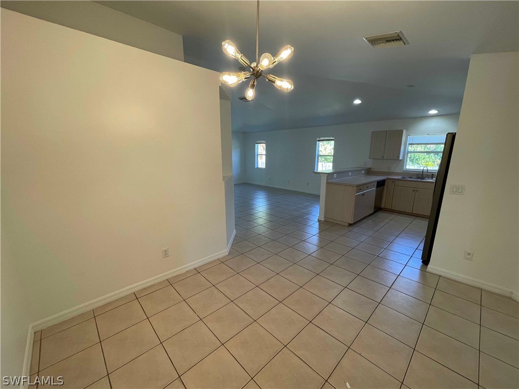 5568-5570 Judith Road Bokeelia, FL 33922 - Photo 4 of 22 a view of an empty room with a mirror