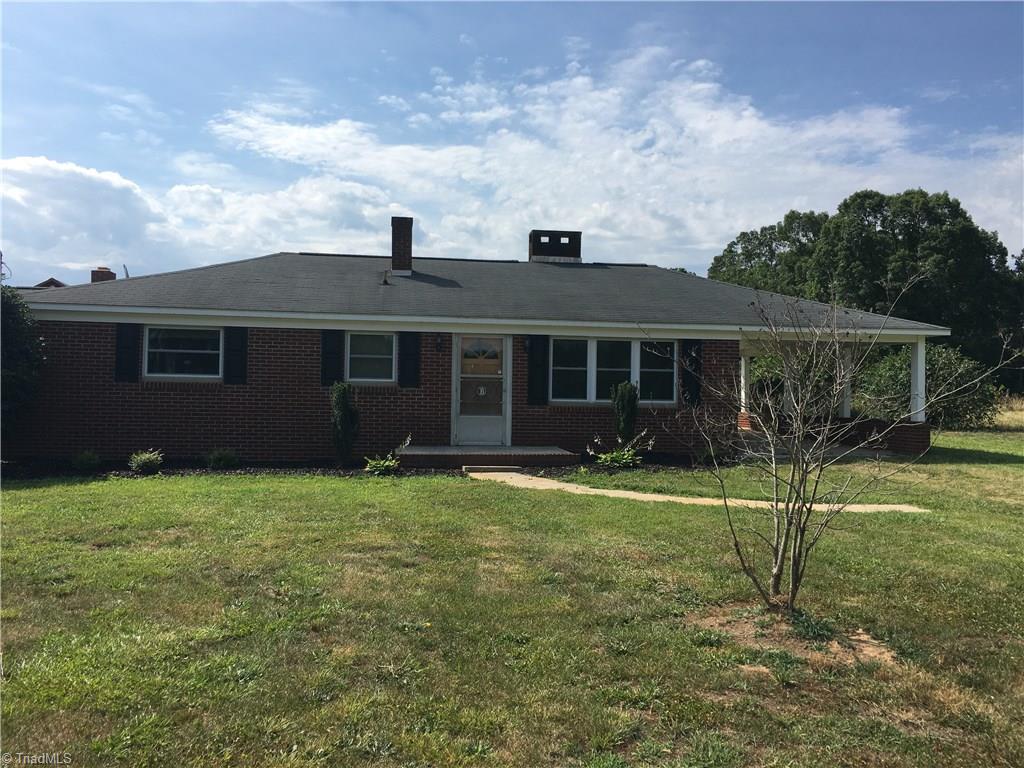 1935 Upper Road Seagrove, NC 27341 - Photo 1 of 26 3 Bedroom brick home with 69+/- Acres!