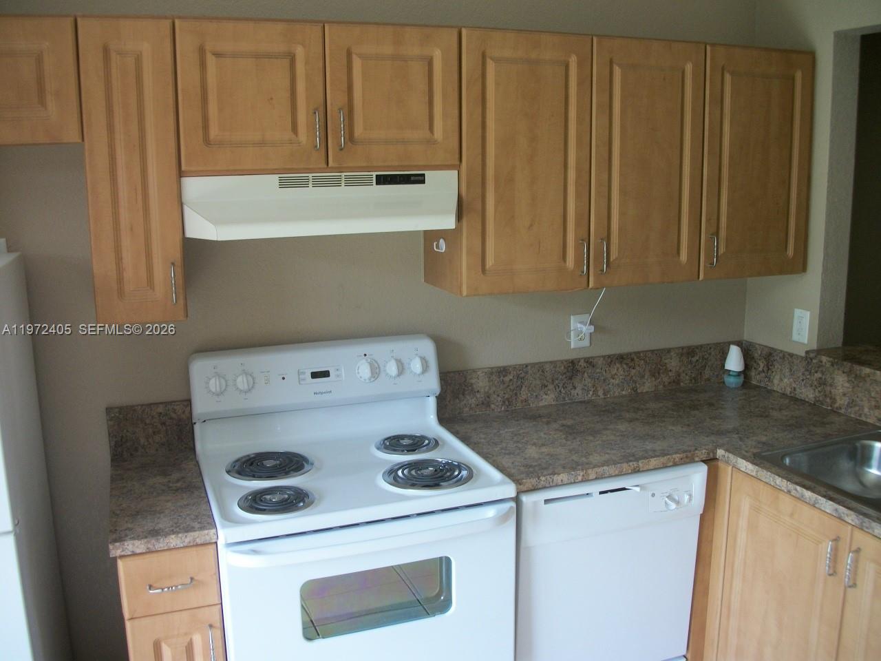 136 Southwest 15th Terrace Homestead, FL 33030 - Photo 11 of 37 a utility room with dryer and washer