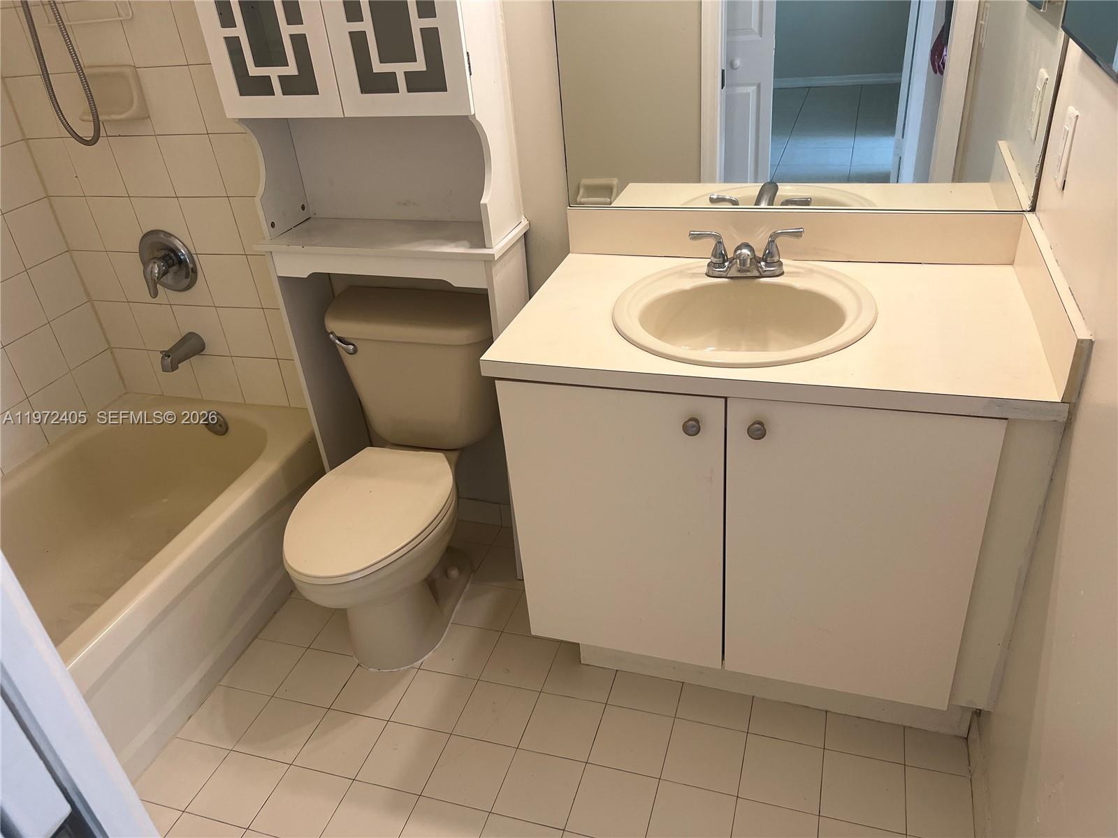 136 Southwest 15th Terrace Homestead, FL 33030 - Photo 23 of 37 a bathroom with a sink toilet and shower