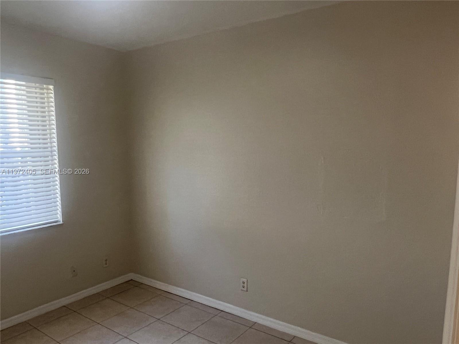 136 Southwest 15th Terrace Homestead, FL 33030 - Photo 30 of 37 a small space with a window