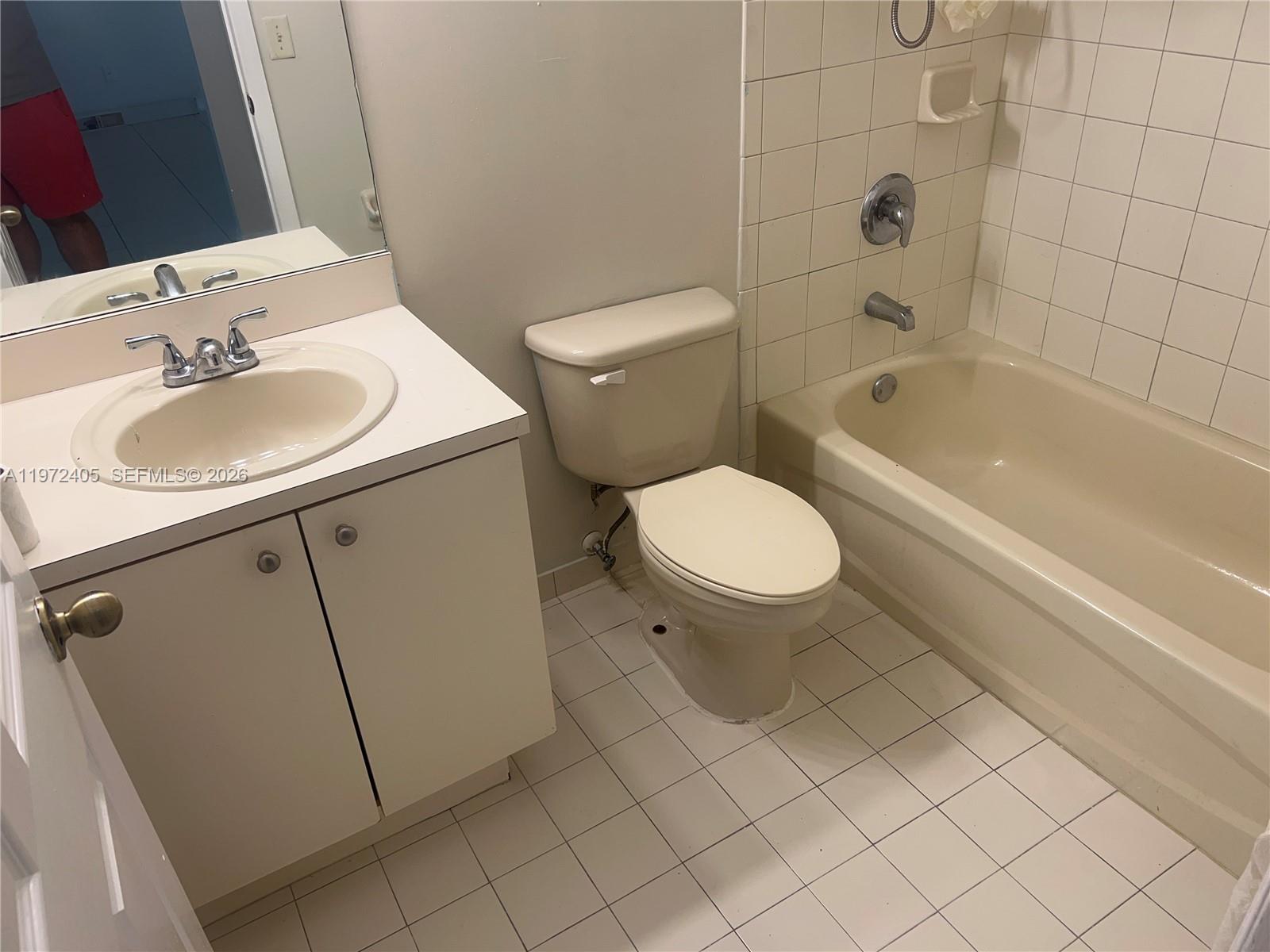 136 Southwest 15th Terrace Homestead, FL 33030 - Photo 32 of 37 a bathroom with a sink toilet and shower