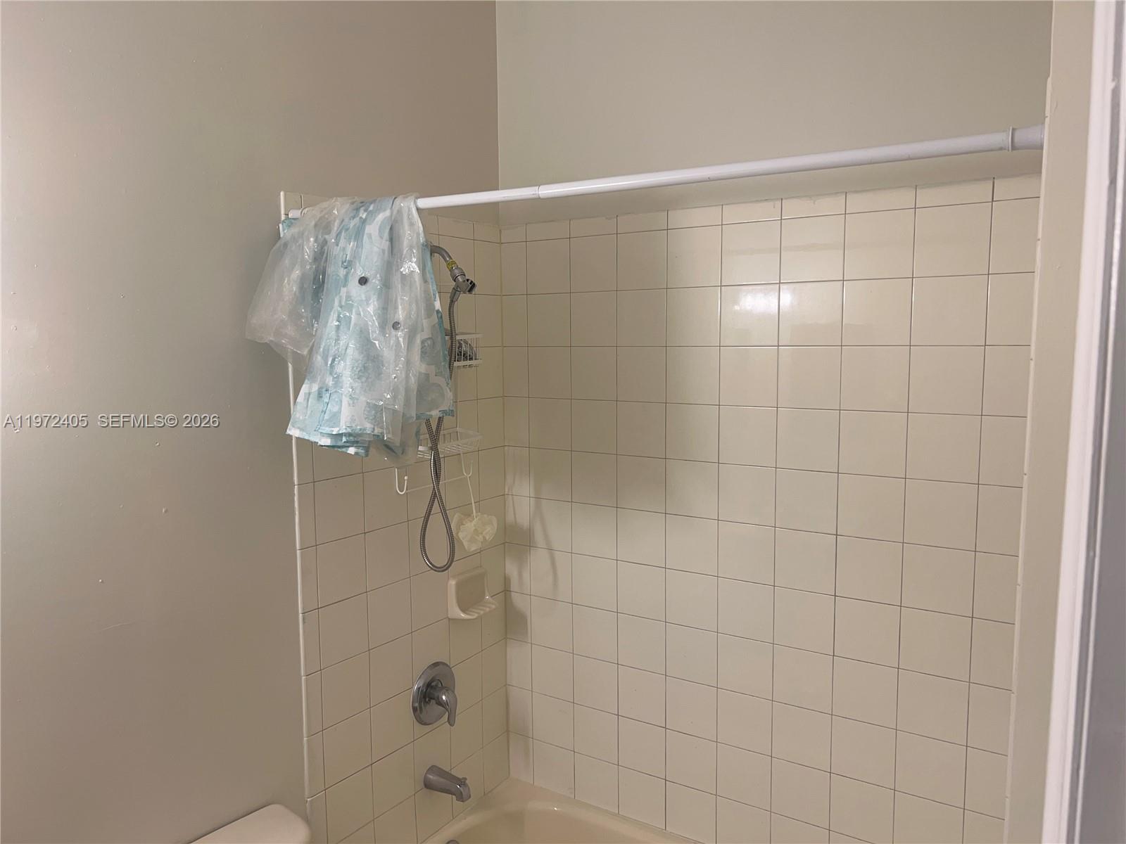 136 Southwest 15th Terrace Homestead, FL 33030 - Photo 34 of 37 a bathroom with a shower