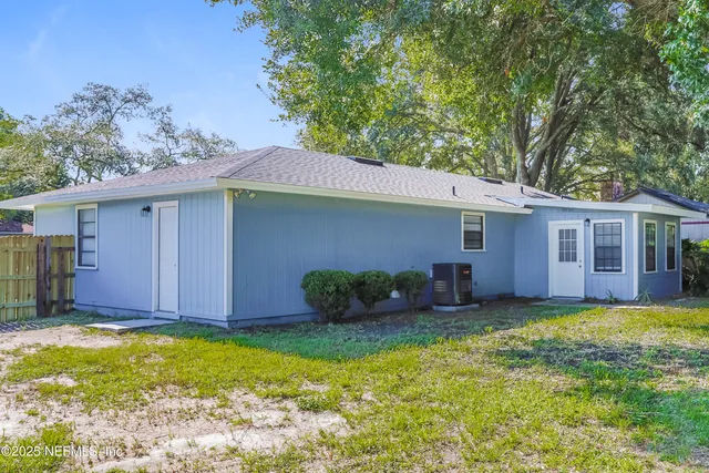 a house view with a garden space