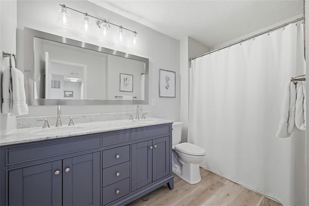 226 Foxwood Road Coraopolis, PA 15108 - Photo 27 of 42 Updated full bath serving secondary bedrooms with fresh, modern finishes.