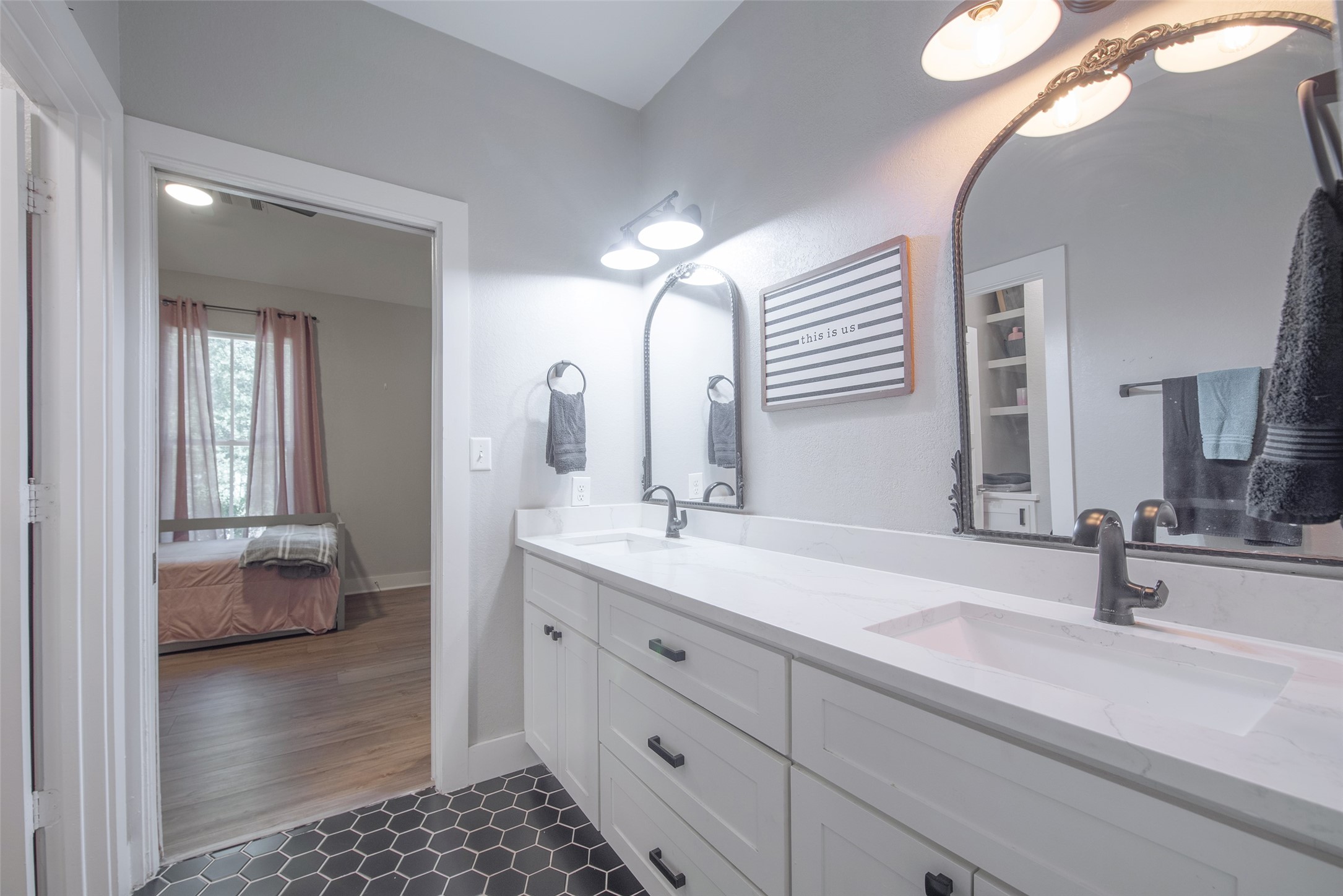 28406 Riley Road Waller, TX 77484 - Photo 19 of 31 Shared bathroom...separate sinks. Sometimes peace in the family comes down to good design.