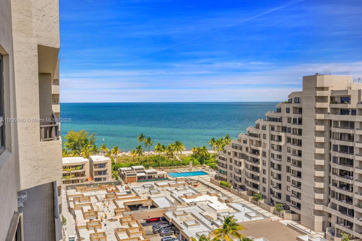 a view of a balcony with an ocean view