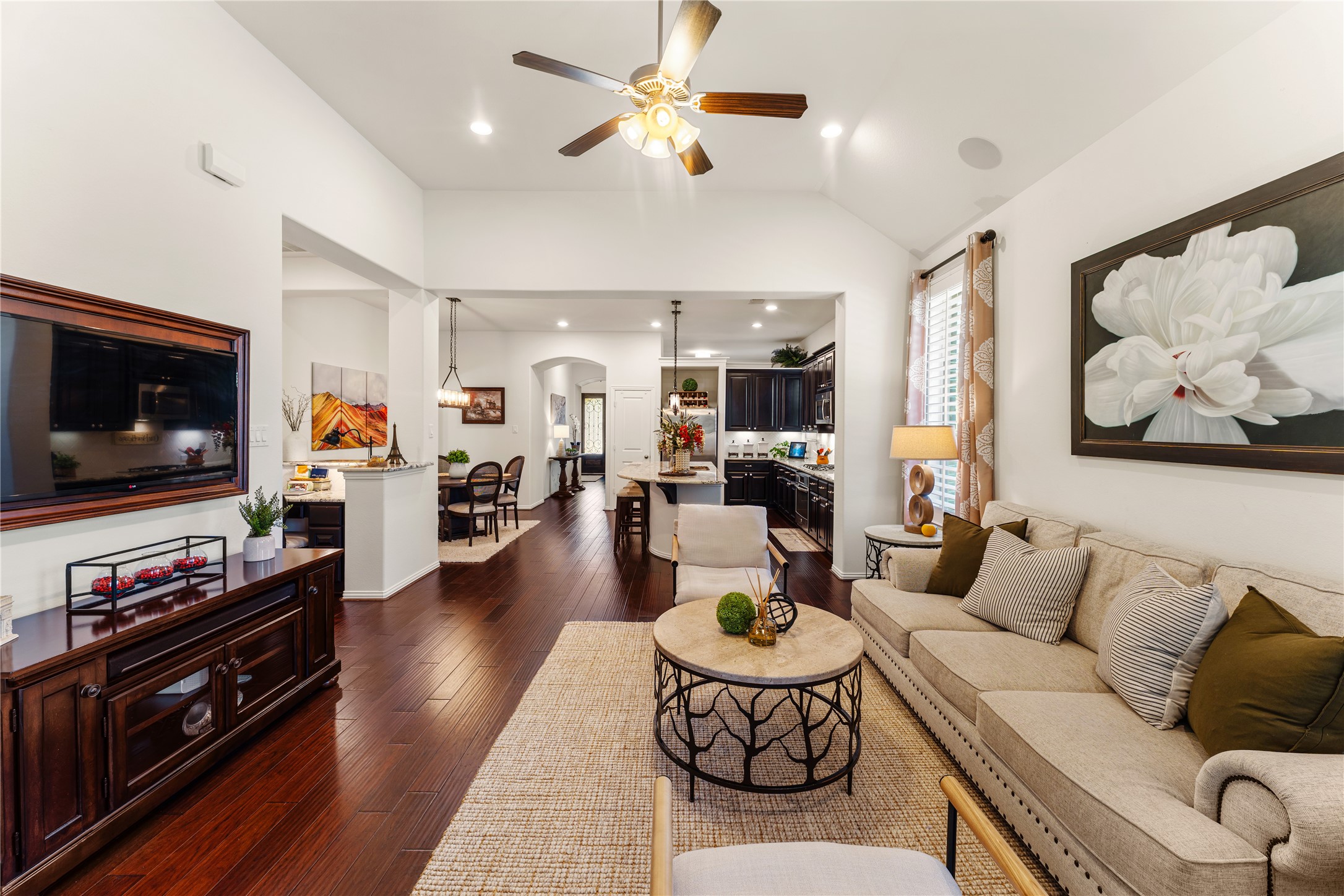 6014 Barrett Cove Court Richmond, TX 77407 - Photo 22 of 45 a living room with furniture and a flat screen tv