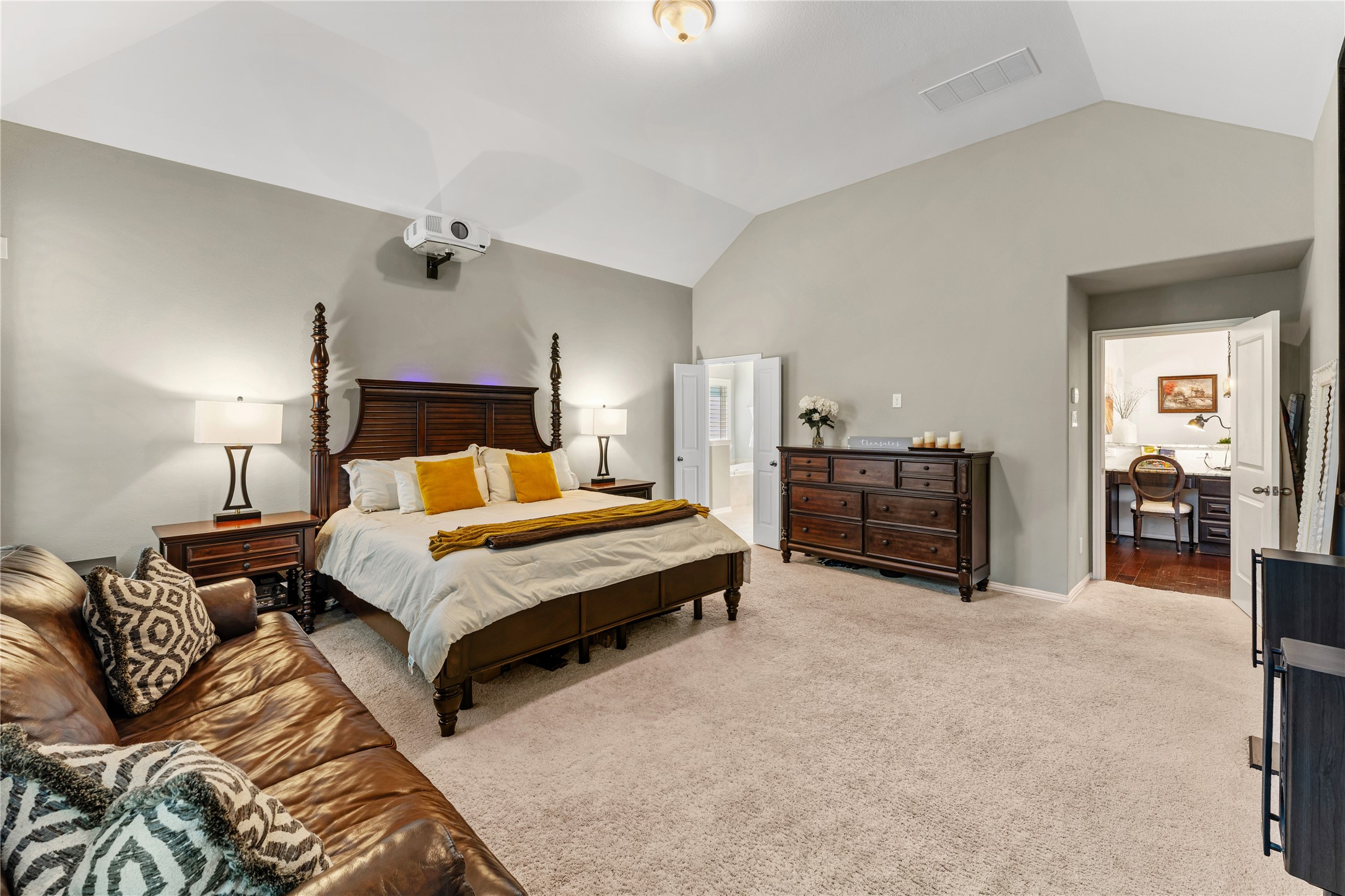 6014 Barrett Cove Court Richmond, TX 77407 - Photo 26 of 45 a bedroom with a bed and furniture