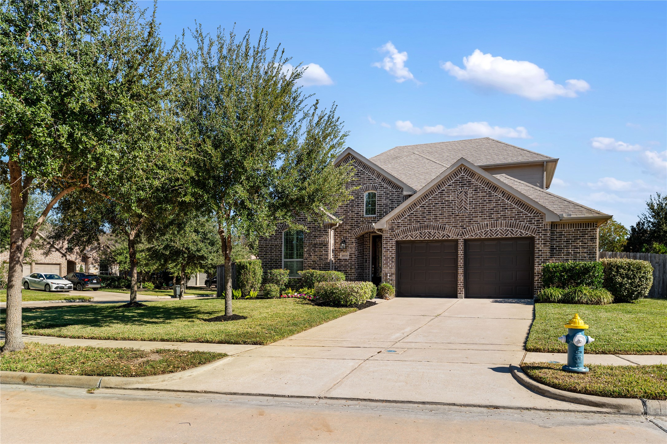 6014 Barrett Cove Court Richmond, TX 77407 - Photo 3 of 45 a front view of a house with a yard