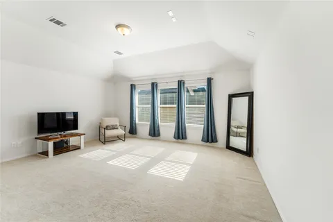 a view of a livingroom with a flat screen tv