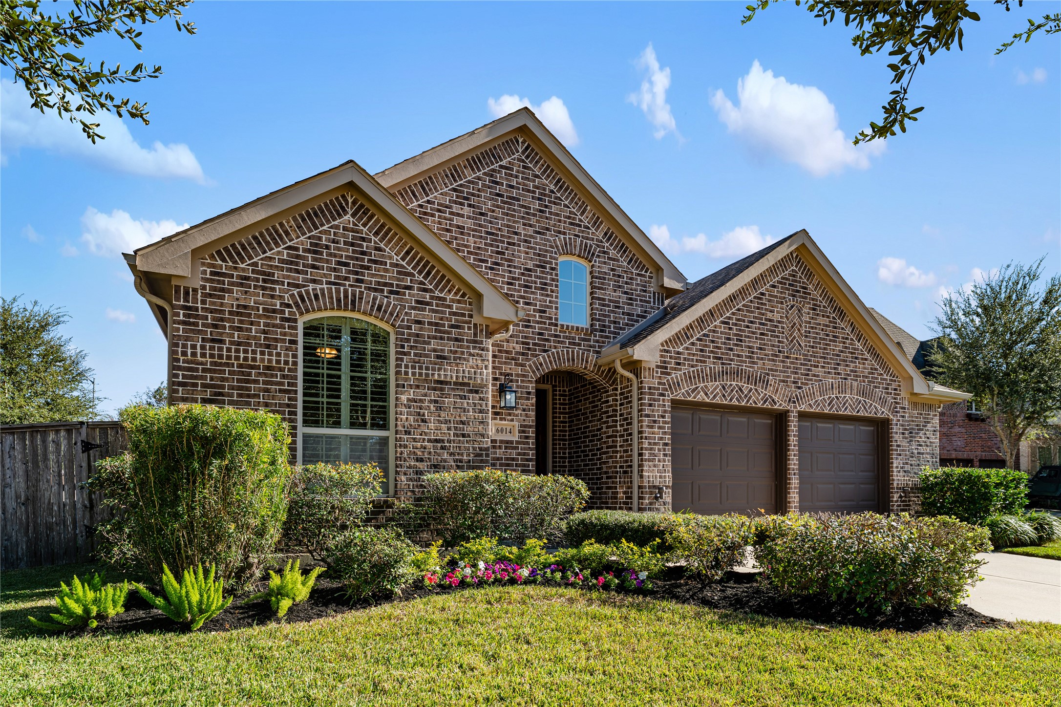 6014 Barrett Cove Court Richmond, TX 77407 - Photo 5 of 45 front view of a house with a yard