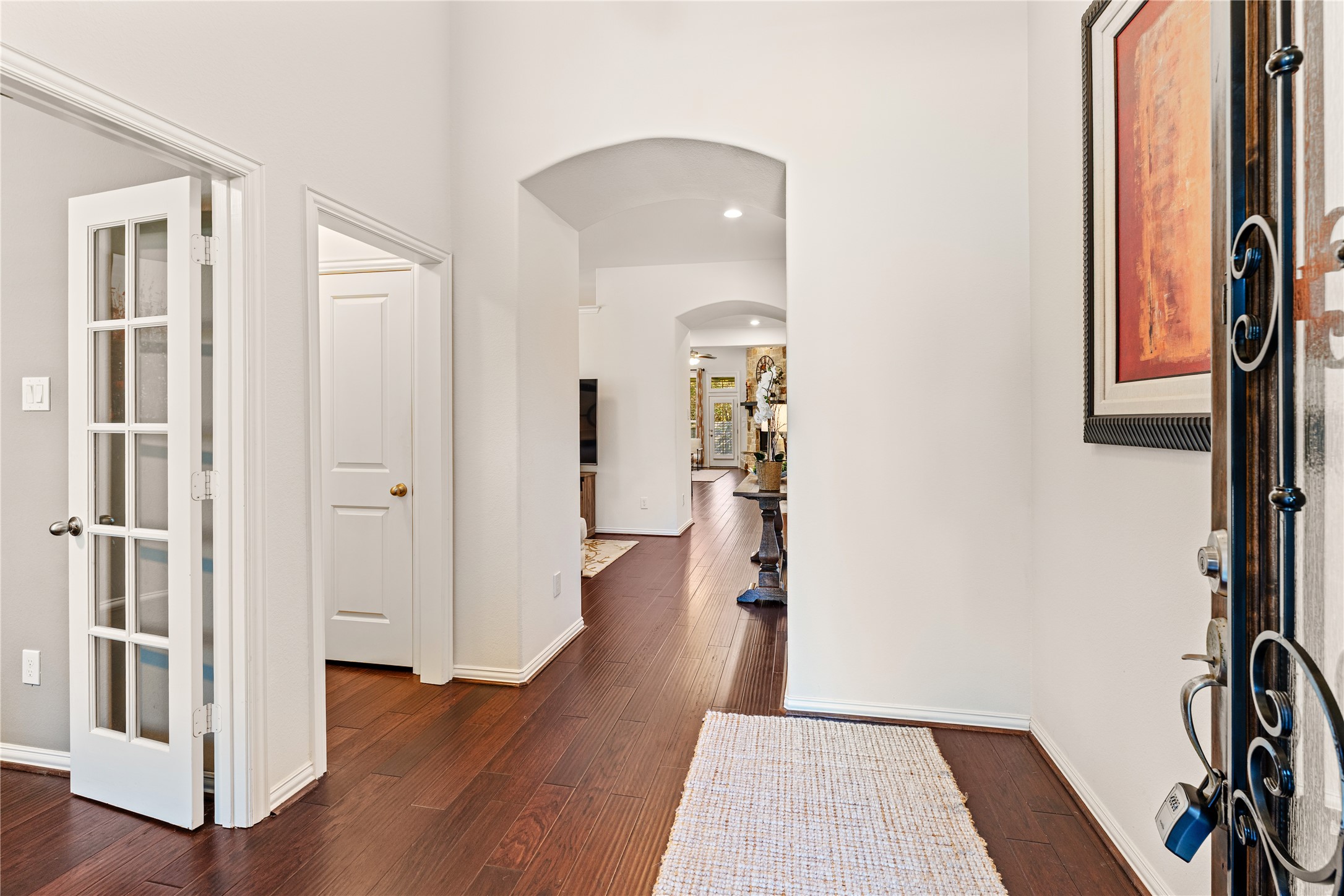 6014 Barrett Cove Court Richmond, TX 77407 - Photo 6 of 45 a view of entryway with wooden floor and stairs