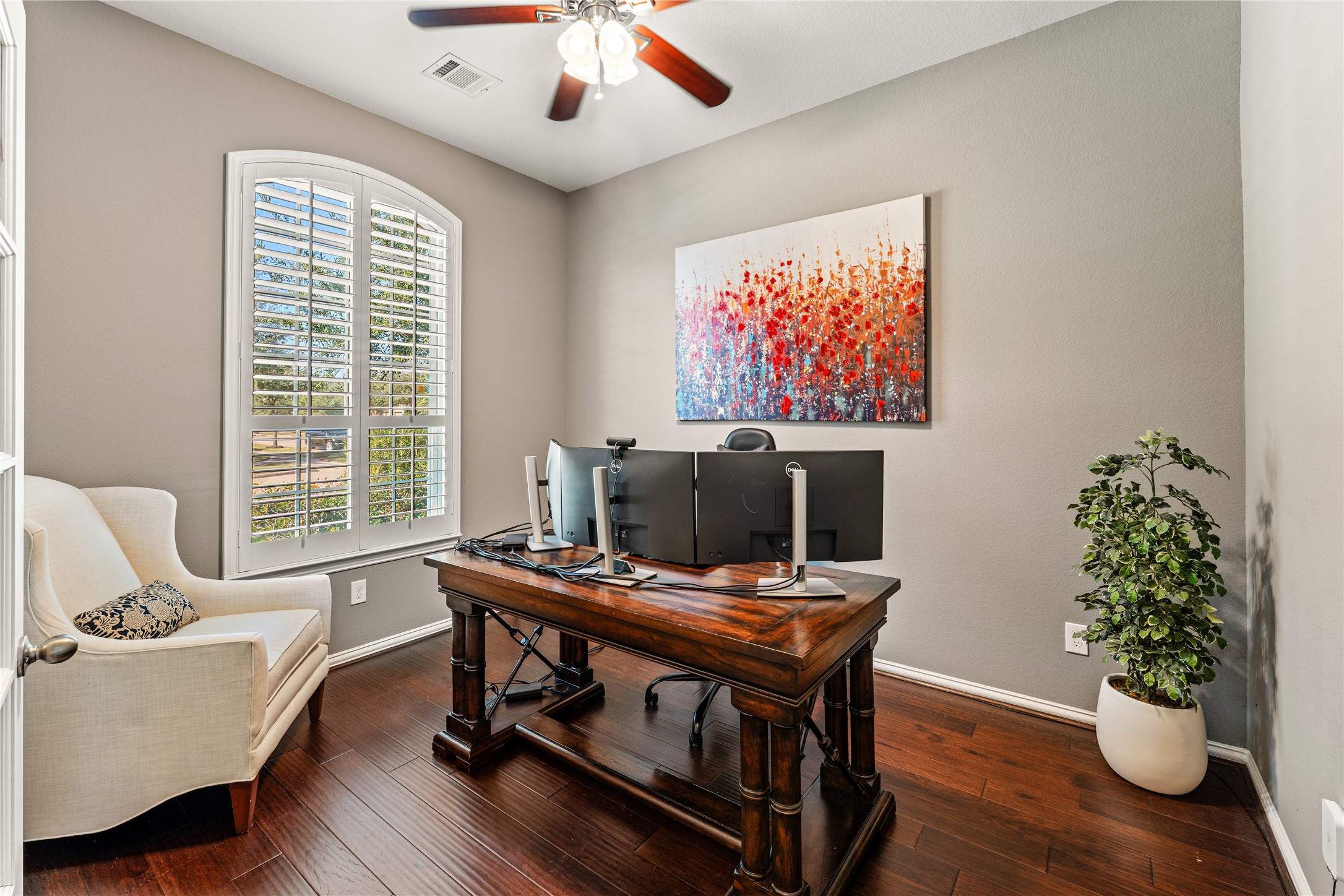 6014 Barrett Cove Court Richmond, TX 77407 - Photo 7 of 45 a workspace with furniture and a potted plant