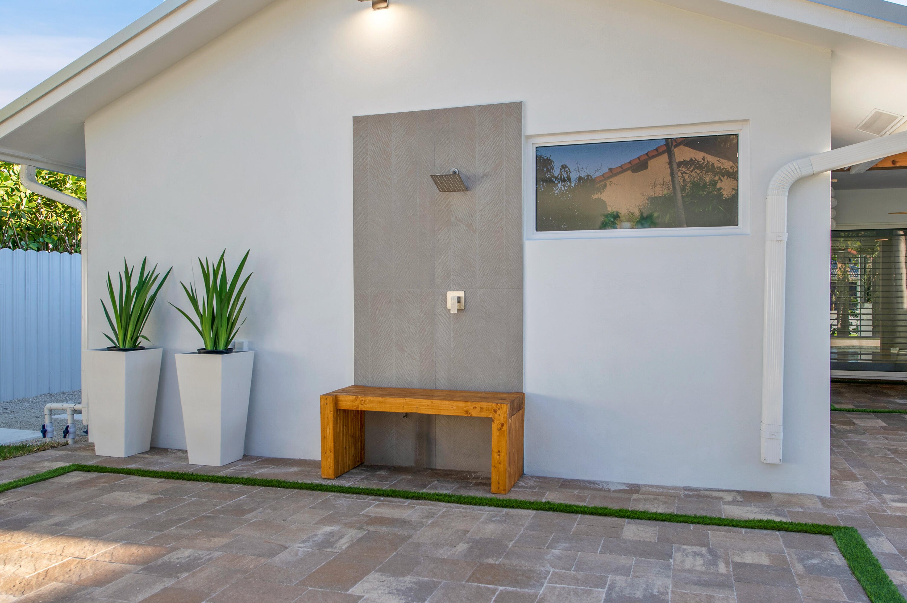 1499 Southwest 20th Street Boca Raton, FL 33486 - Photo 69 of 82 a view of a hallway with potted plant
