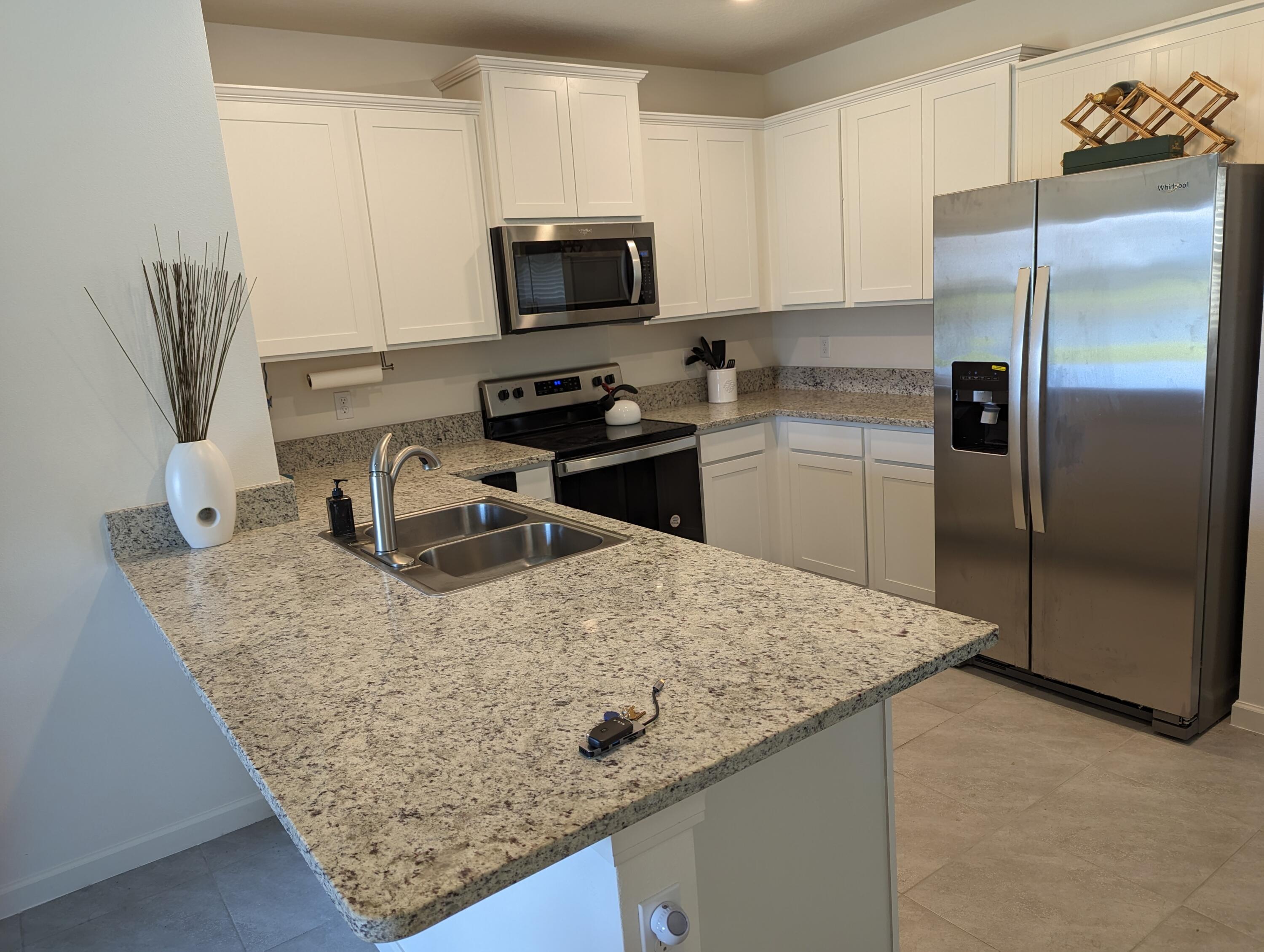 12176 Rimini Way Port St. Lucie, FL 34987 - Photo 7 of 14 Kitchen