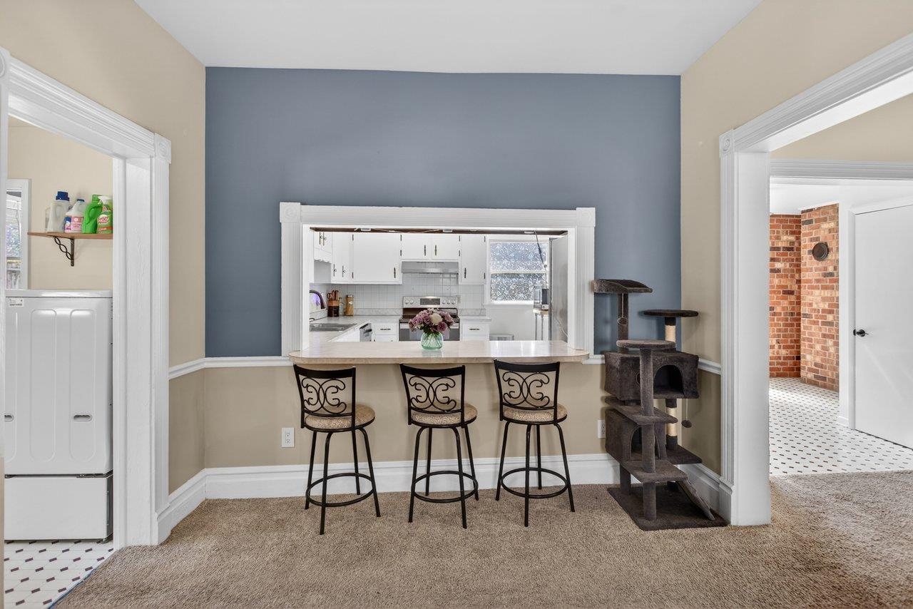 420 West Spring Street Woodstock, VA 22664 - Photo 25 of 67 a view of a dining room with furniture and window