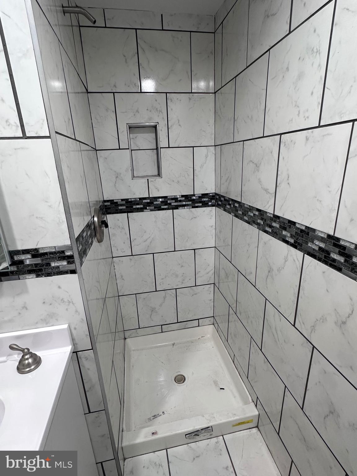 5254 Jefferson Street Philadelphia, PA 19131 - Photo 17 of 30 a bathroom with a bathtub