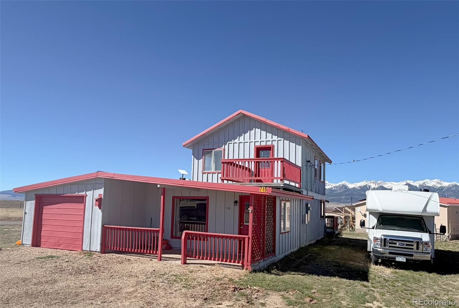 715 2nd Street Silver Cliff, CO 81252 - Photo 5 of 16 a view of a house with a balcony