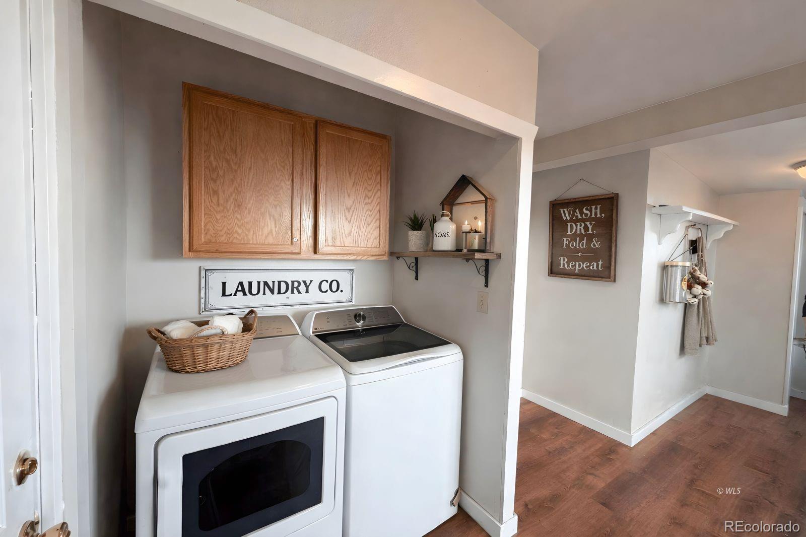 715 2nd Street Silver Cliff, CO 81252 - Photo 7 of 16 a kitchen with a stove and cabinets