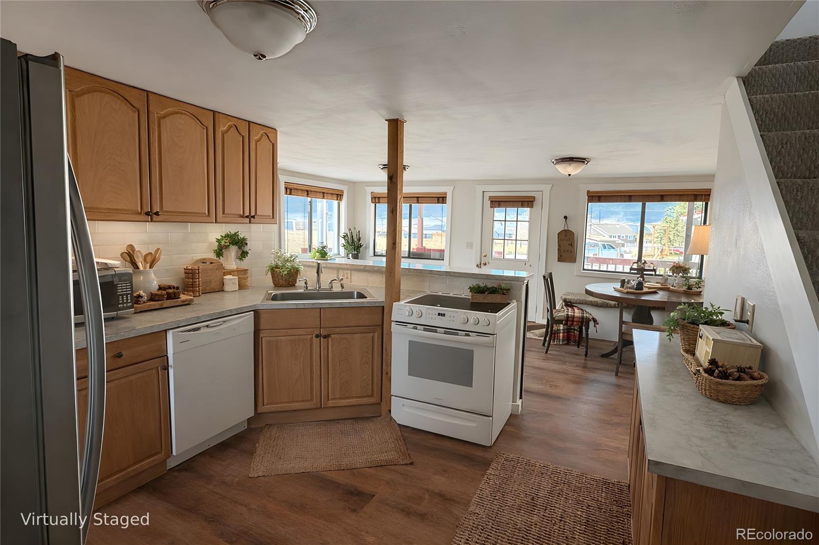 715 2nd Street Silver Cliff, CO 81252 - Photo 8 of 16 a kitchen with sink cabinets and outdoor