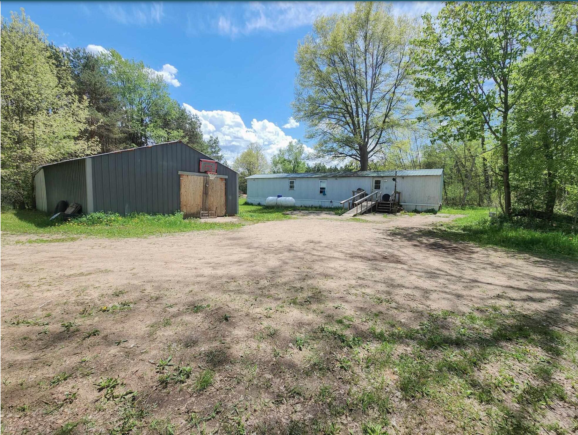 11733 5 Mile Road Evart, MI 49631 - Photo 1 of 1 This 2-bedroom, 1-bath mobile home sits
