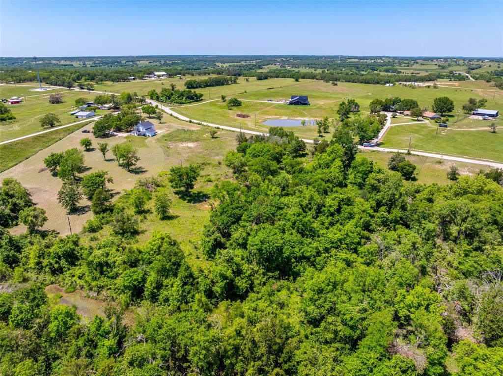 1874 County Road Springtown, TX 76082 - Photo 9 of 24 a view of an outdoor space and a lake view
