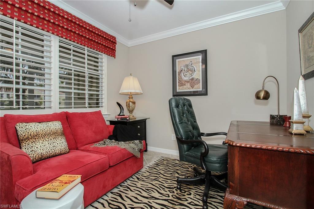 8531 Violeta Street, Unit 101 Estero, FL 34135 - Photo 14 of 23 a work room with furniture and a window