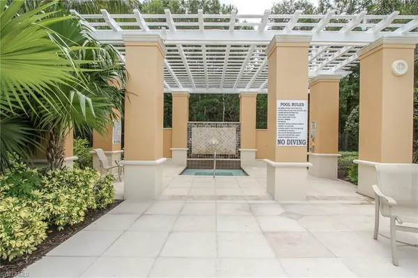a view of a garden with a fountain