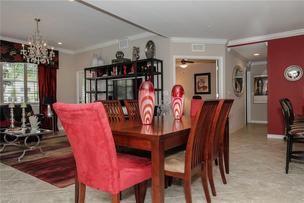 8531 Violeta Street, Unit 101 Estero, FL 34135 - Photo 8 of 23 a view of a dining room with furniture