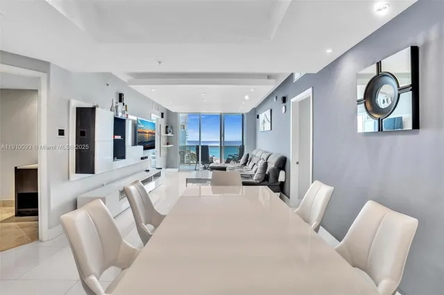 a living room with furniture a couch and a fireplace