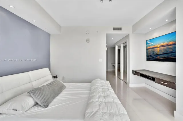 a view of a swimming pool with a lounge chair