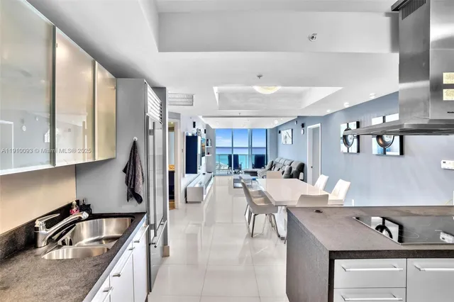 a kitchen with counter top space cabinets and stainless steel appliances