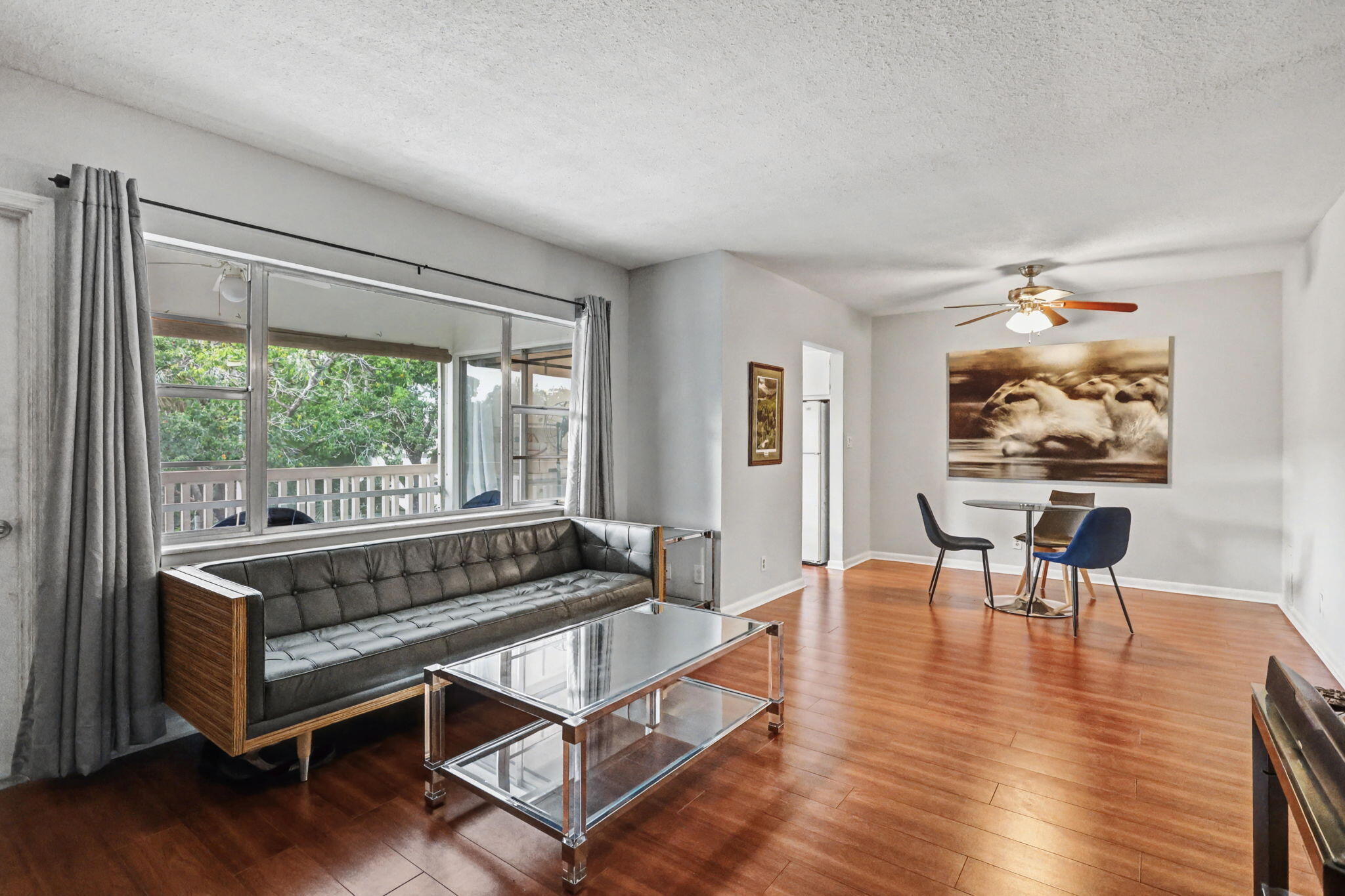 100 Royal Palm Way, Unit 303 Boca Raton, FL 33432 - Photo 11 of 35 a view of a room with furniture window and wooden floor