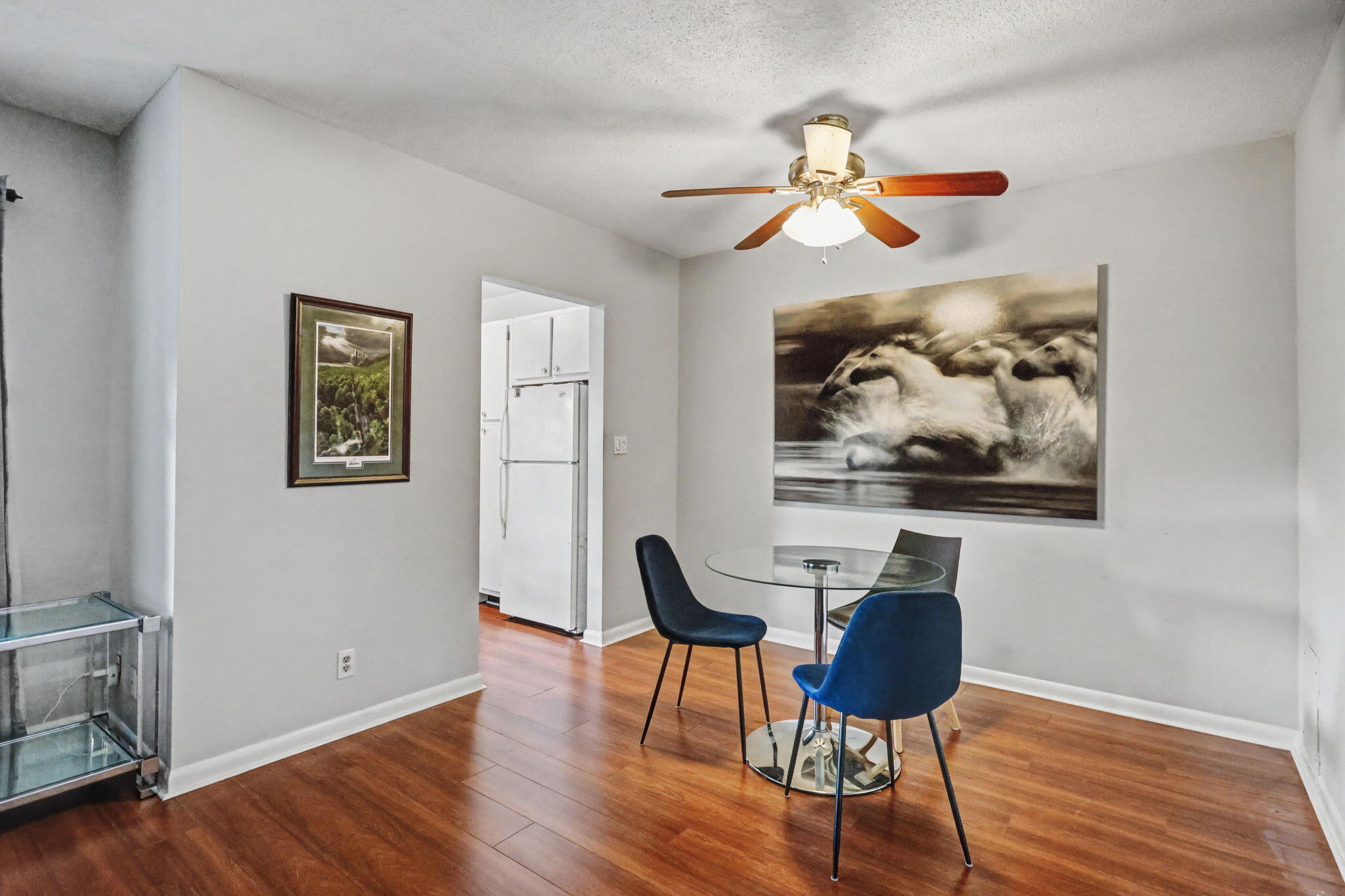 100 Royal Palm Way, Unit 303 Boca Raton, FL 33432 - Photo 12 of 35 a view of a workspace with furniture and wooden floor