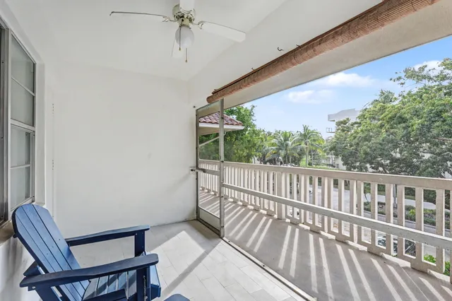 a view of balcony with furniture