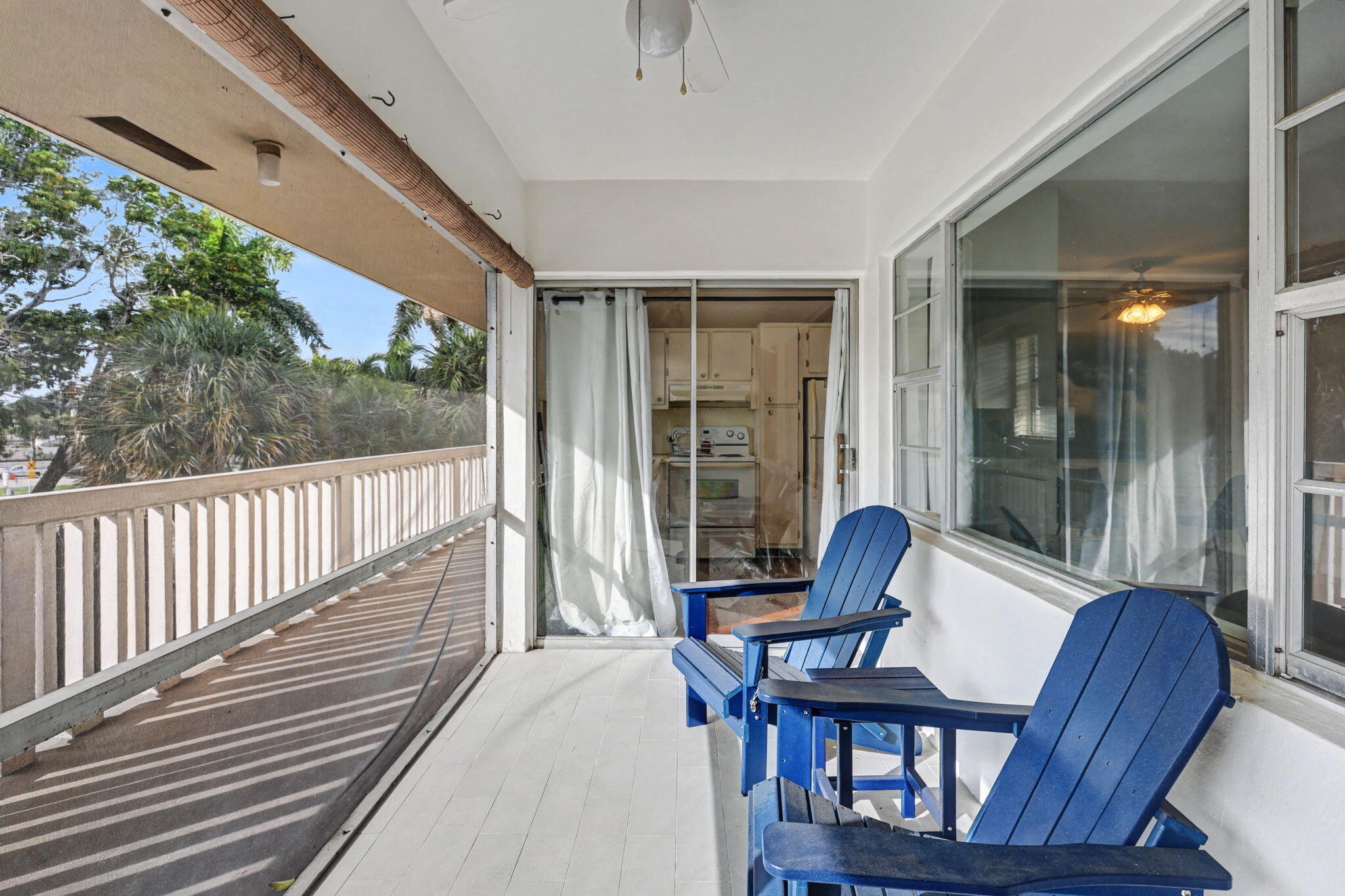 100 Royal Palm Way, Unit 303 Boca Raton, FL 33432 - Photo 5 of 35 a view of a porch with furniture and wooden floor