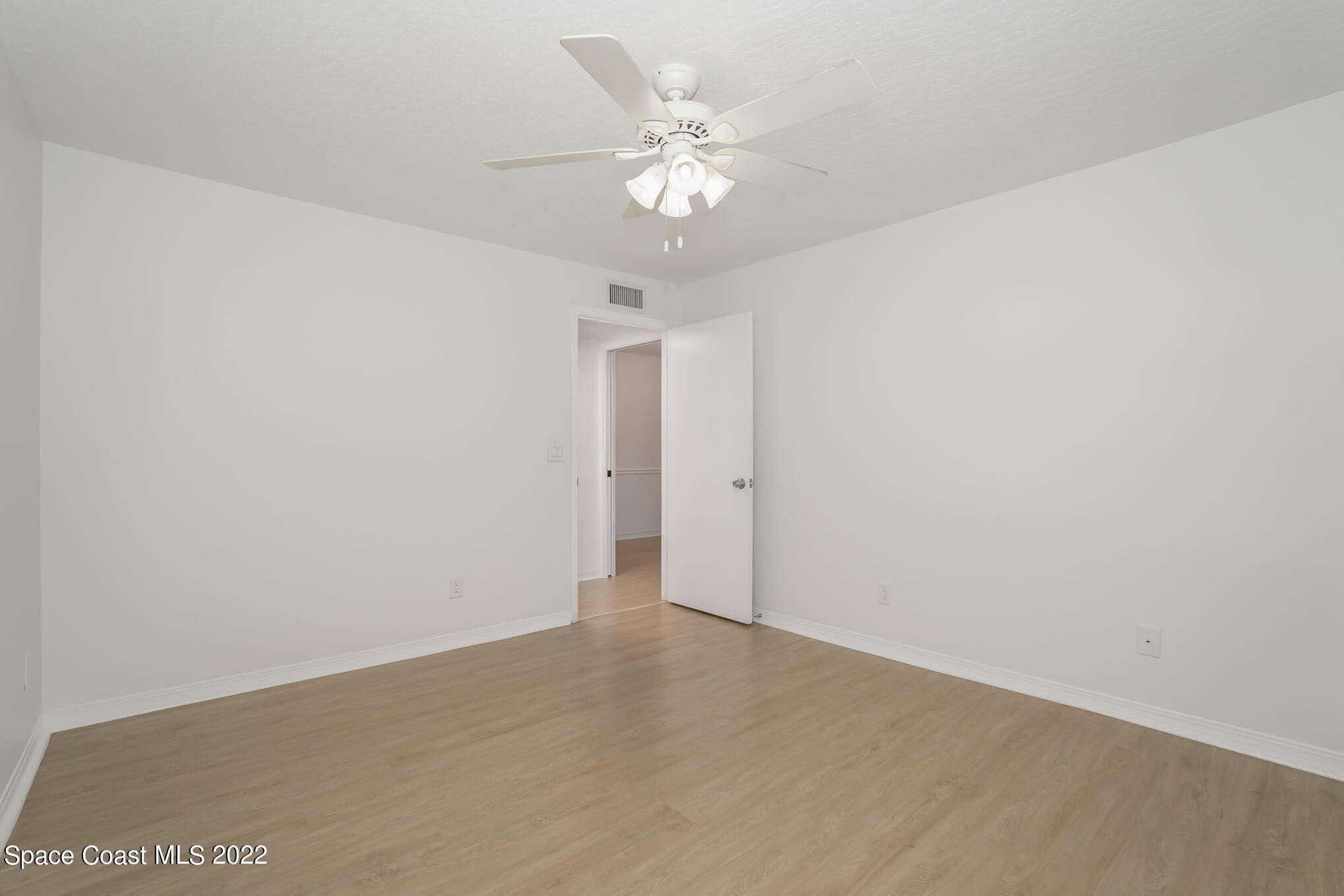 7667 North Wickham Road, Unit 113 Melbourne, FL 32940 - Photo 13 of 29 a view of an empty room