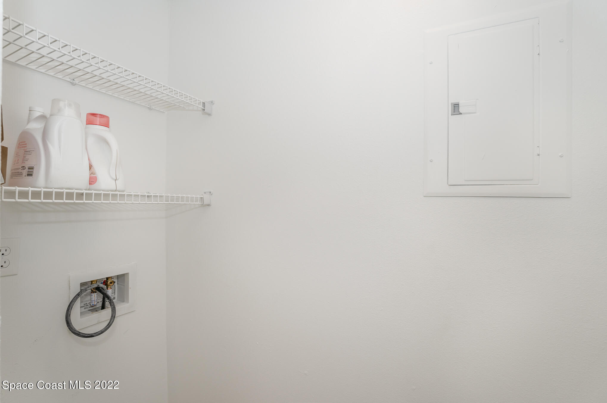 7667 North Wickham Road, Unit 113 Melbourne, FL 32940 - Photo 20 of 29 a view of small space with racks on the wall