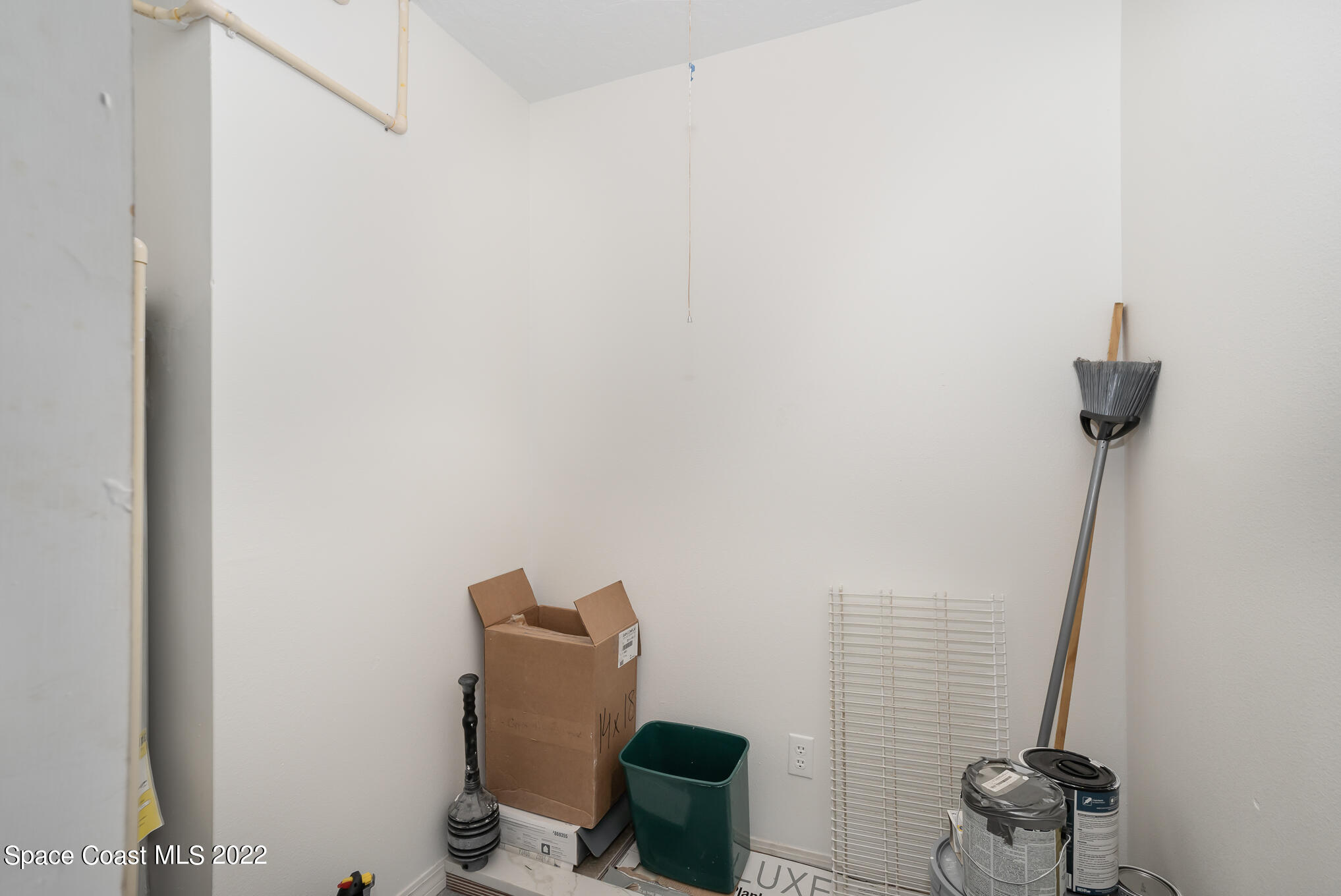 7667 North Wickham Road, Unit 113 Melbourne, FL 32940 - Photo 21 of 29 a bathroom with a sink and toilet