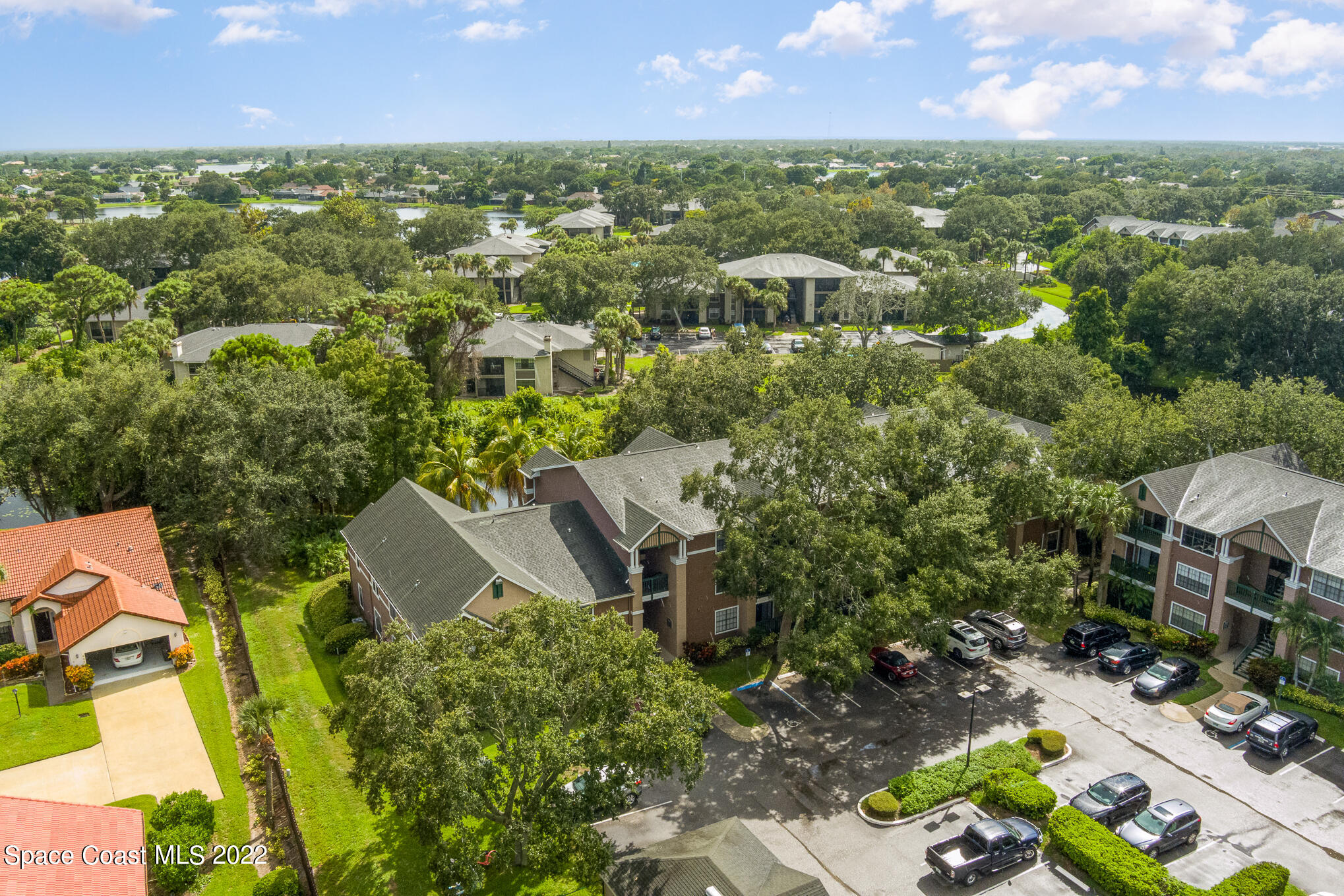 7667 North Wickham Road, Unit 113 Melbourne, FL 32940 - Photo 27 of 29 an aerial view of multiple house