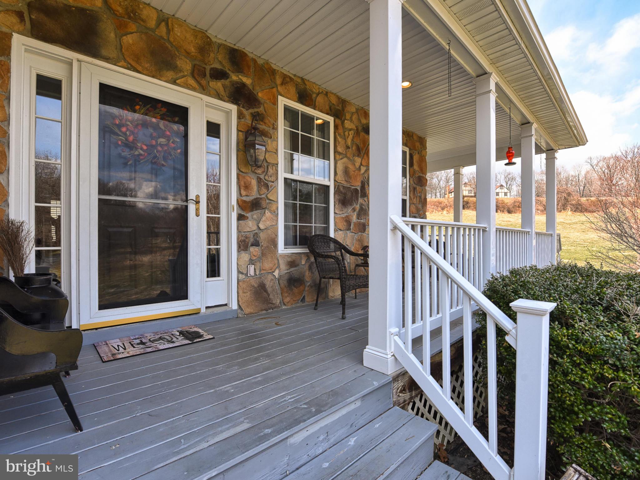 1834 Long Corner Road Mount Airy, MD 21771 - Photo 3 of 44 Spend quiet evenings on this front porch.