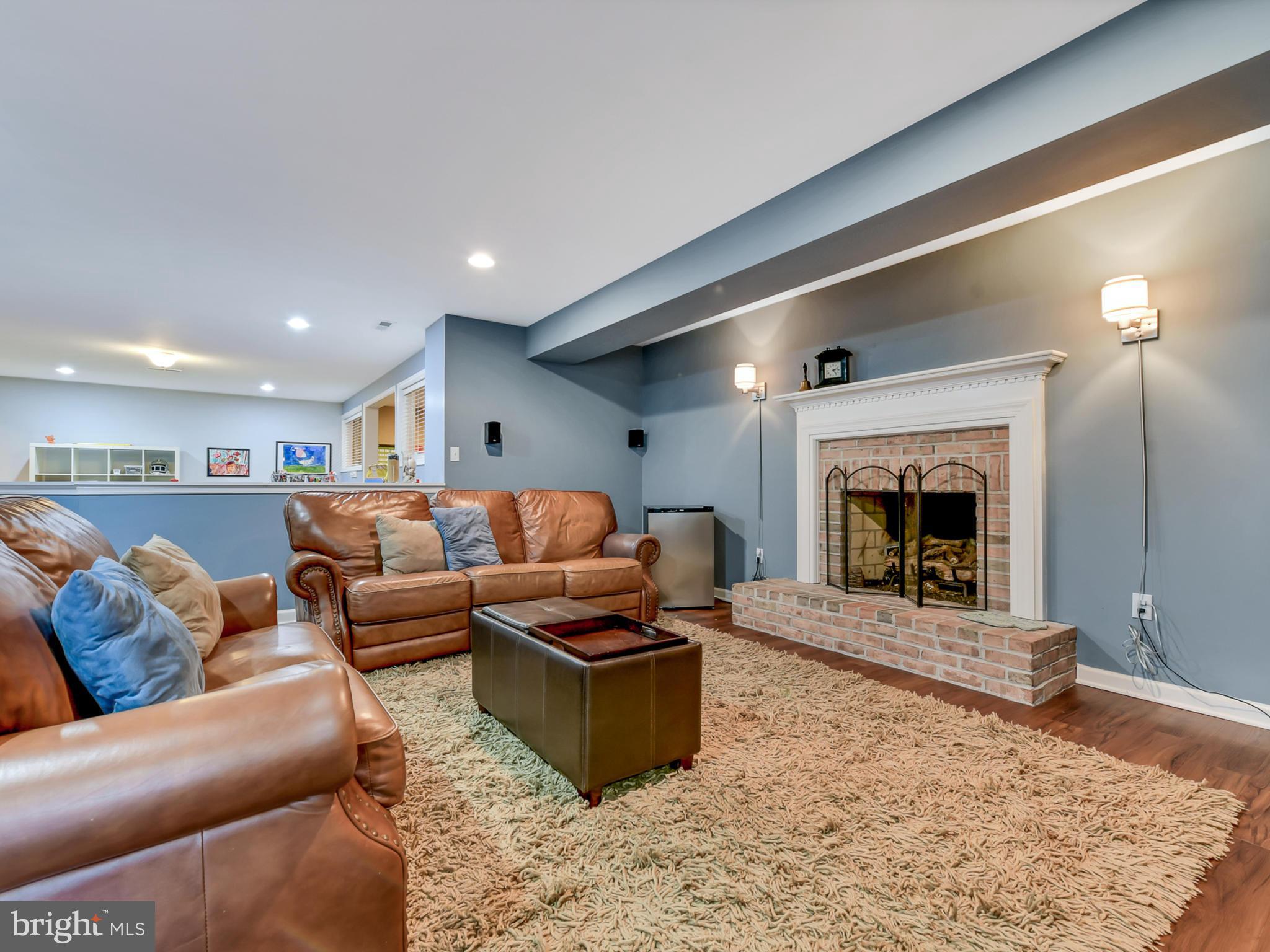 1834 Long Corner Road Mount Airy, MD 21771 - Photo 31 of 44 Cozy up with family in the lower level tv room.