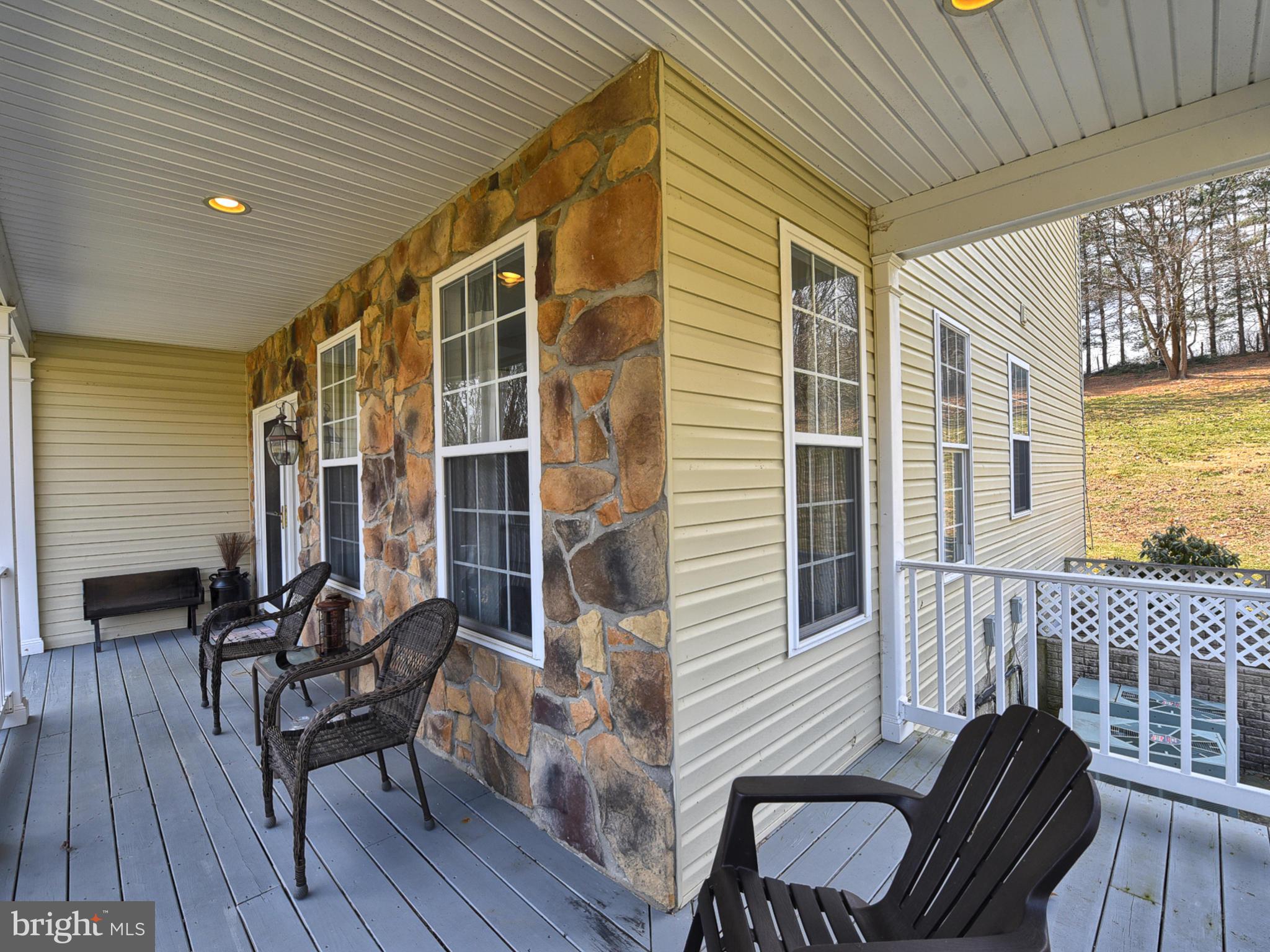 1834 Long Corner Road Mount Airy, MD 21771 - Photo 34 of 44 Spend rainy nights on this covered porch.