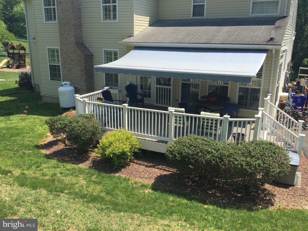 1834 Long Corner Road Mount Airy, MD 21771 - Photo 38 of 44 Spend sunny days under the covered deck.