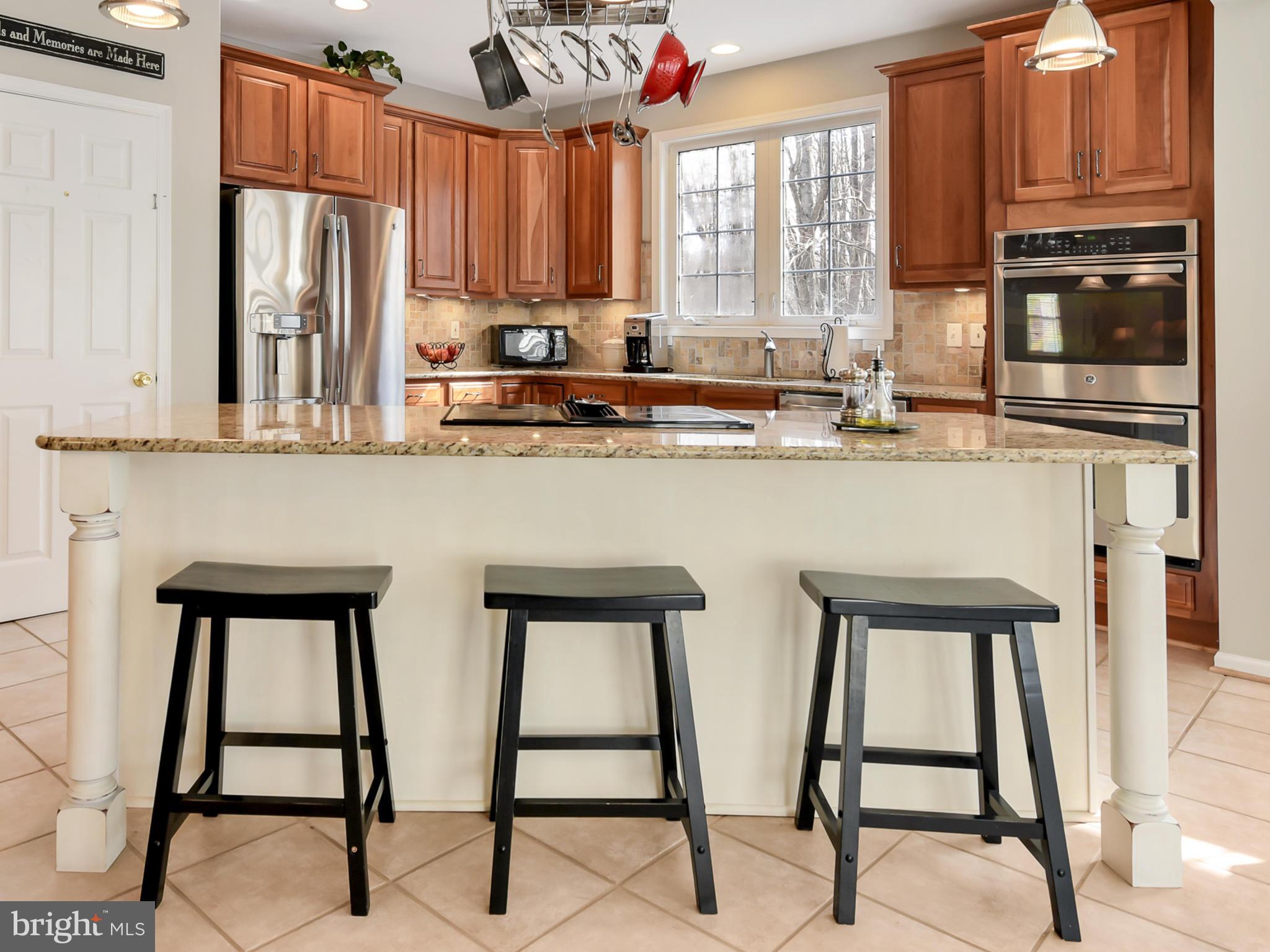1834 Long Corner Road Mount Airy, MD 21771 - Photo 9 of 44 Entertain guests around this large kitchen island.